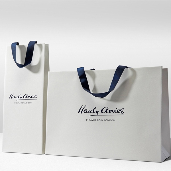 in-tui-giay-so-luong-it-cho-cua-hang-moi-mo